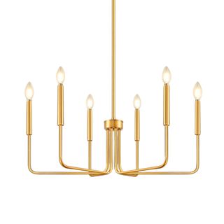 A brushed gold chandelier with six candle lights, with three to the left and three to the right