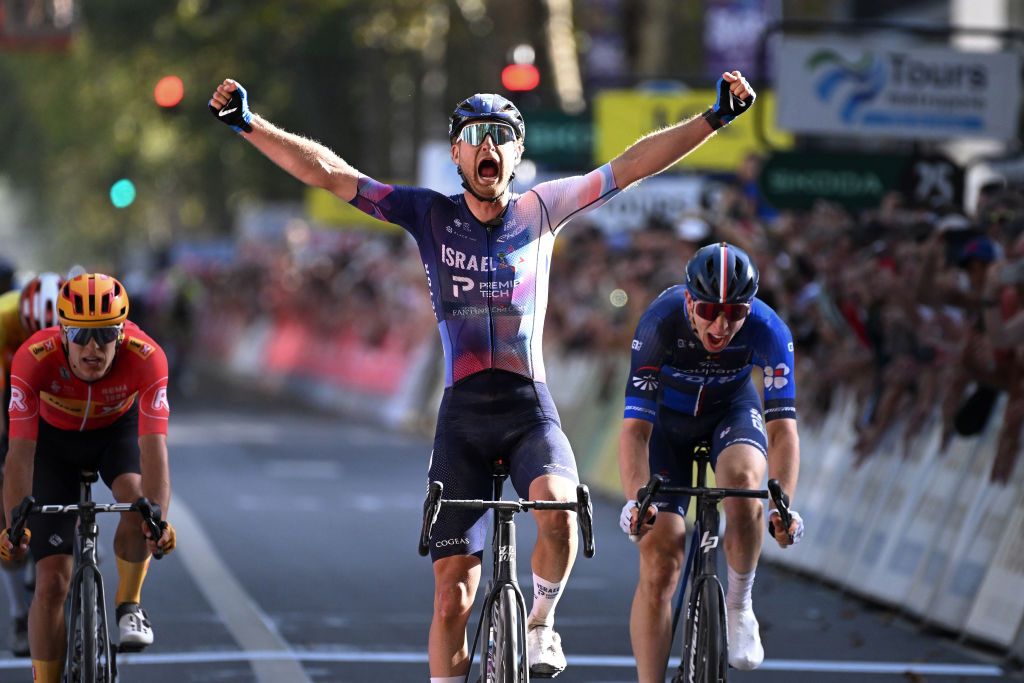 TOURS FRANCE OCTOBER 08 LR Riley Sheehan of The United States and Team Israel Premier Tech celebrates at finish line as race winner ahead of Lewis Askey of The United Kingdom and Team Groupama FDJ during the 117th Paris Tours 2023 a 2139km one day race from Chartres to Tours on October 08 2023 in Tours France Photo by Bruno BadeGetty Images