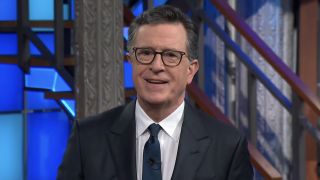 Stephen Colbert looking into the camera and smiling in second-to-last monologue for The Late Show.