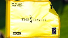 A close-up of The Players Championship pin flag on the 18th hole in 2025