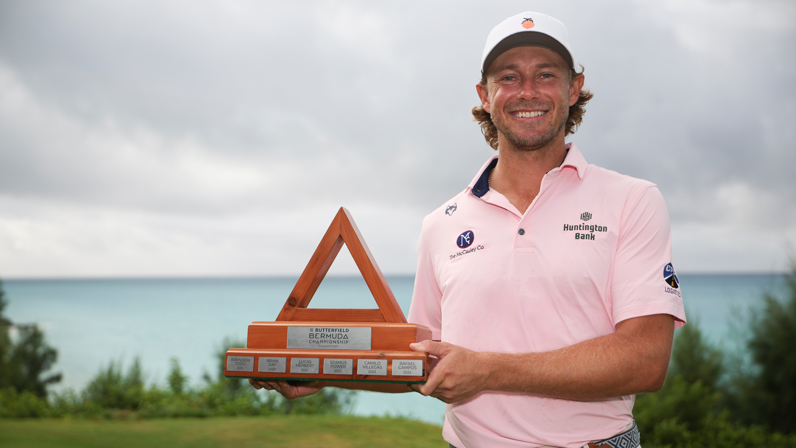 Austin Smotherman holds a trophy