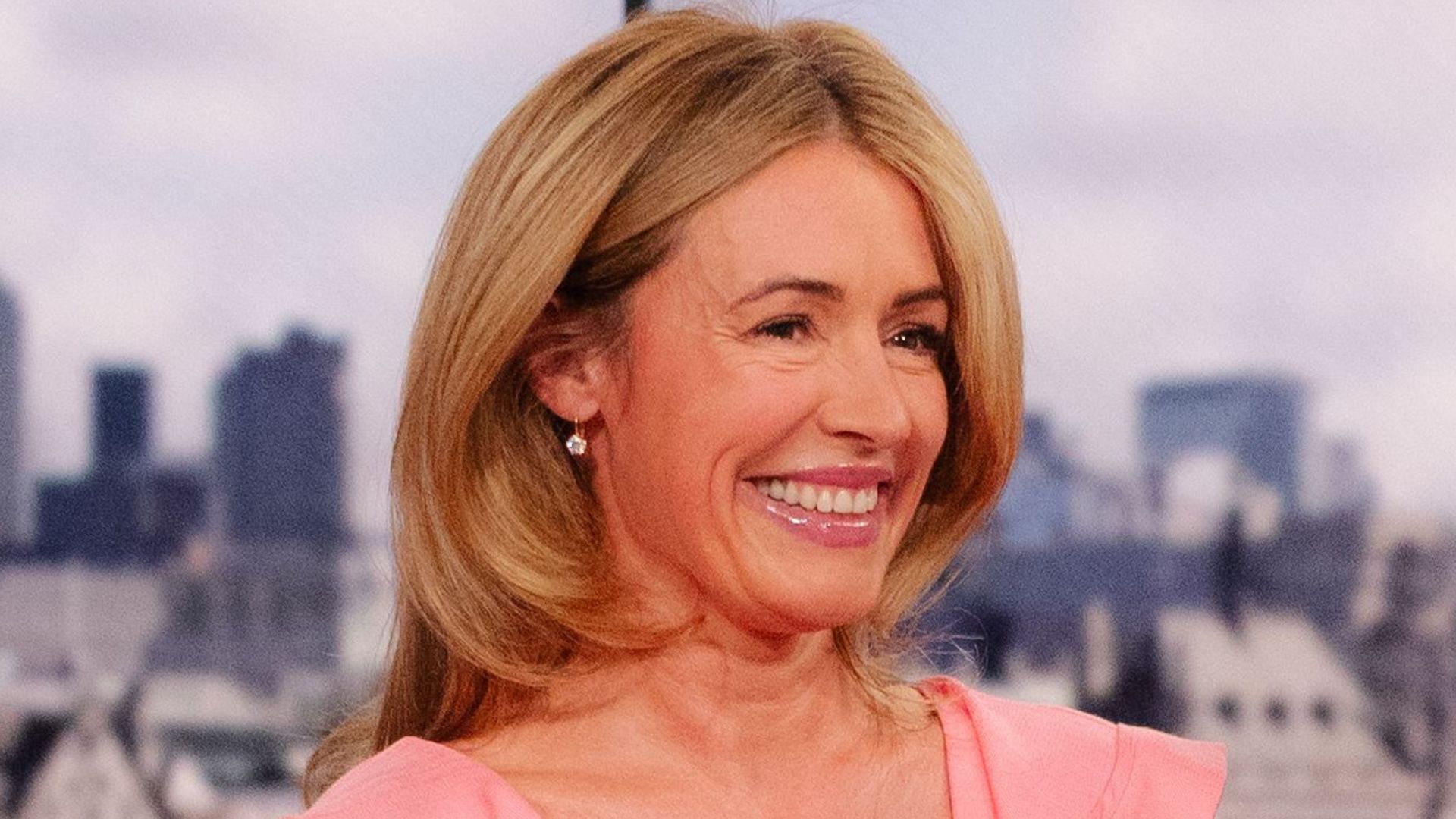 A HEADSHOT OF CAT DEELEY