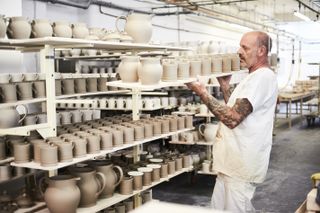 Man with mugs Emma Bridgewater factory