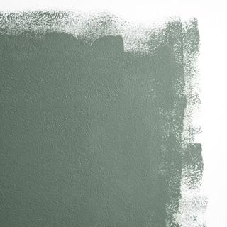 A dark gray-green paint swatch