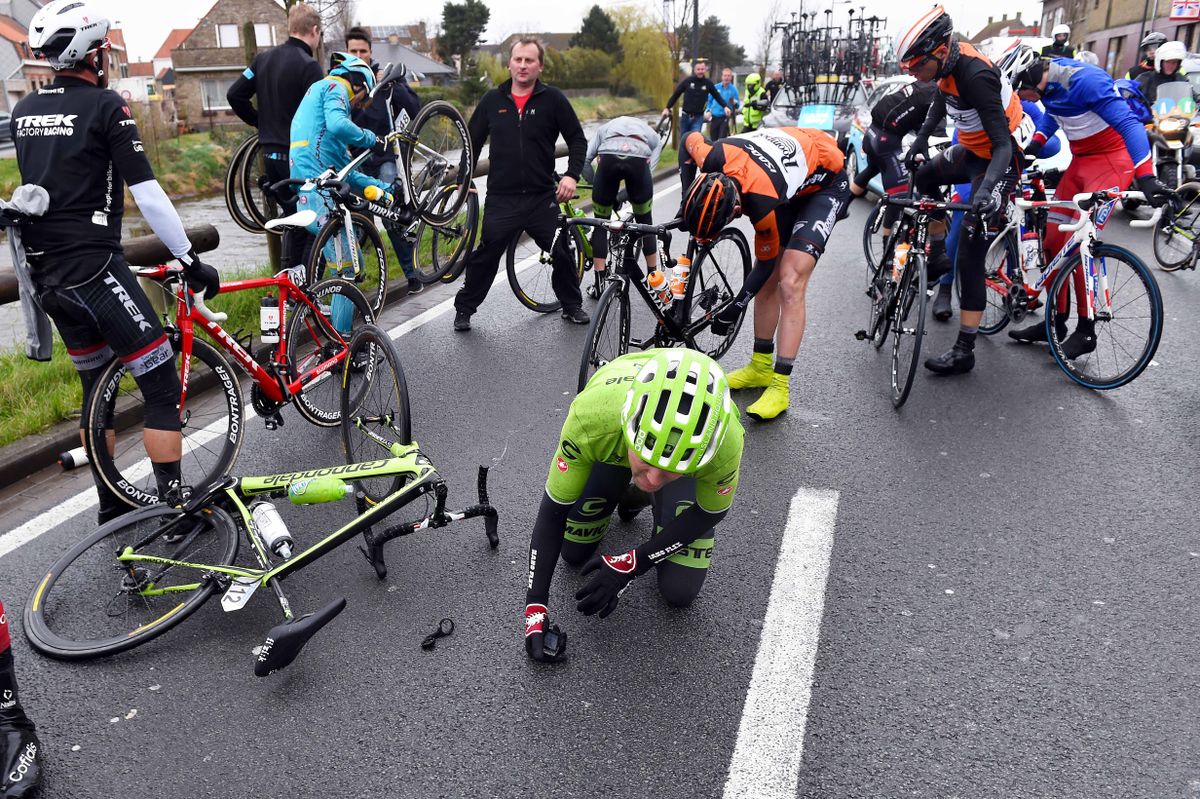 Jack Bauer (Cannondale-Garmin) tried to get up after a heavy crash