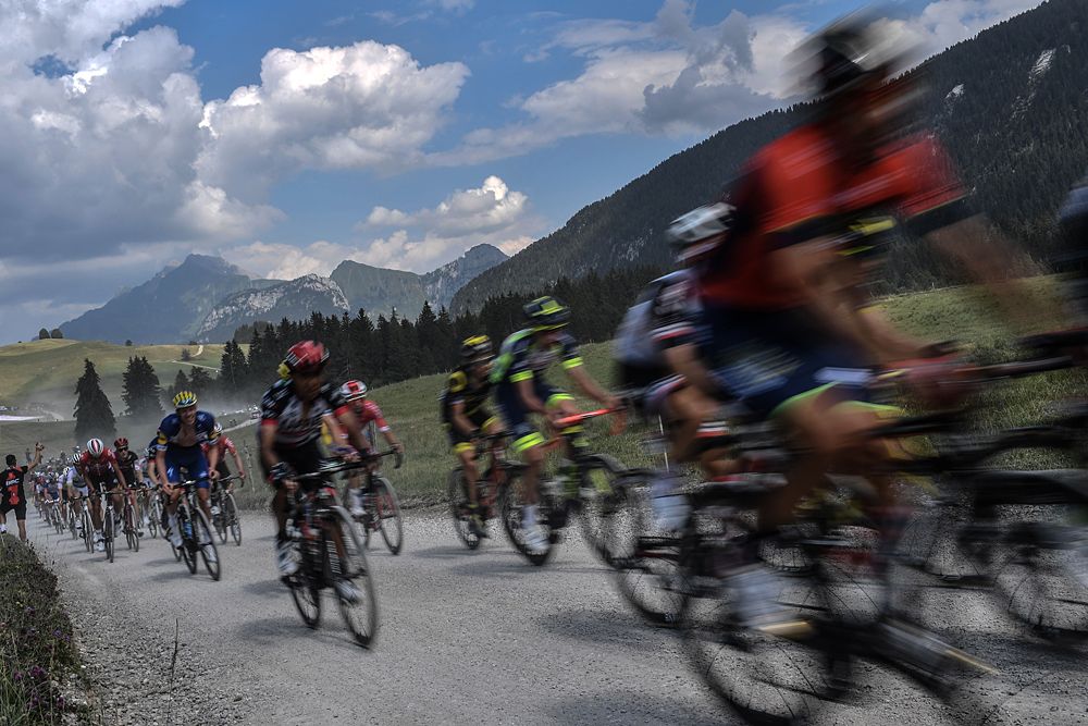 The peloton on the dirt roads during stage 10 at the Tour de France