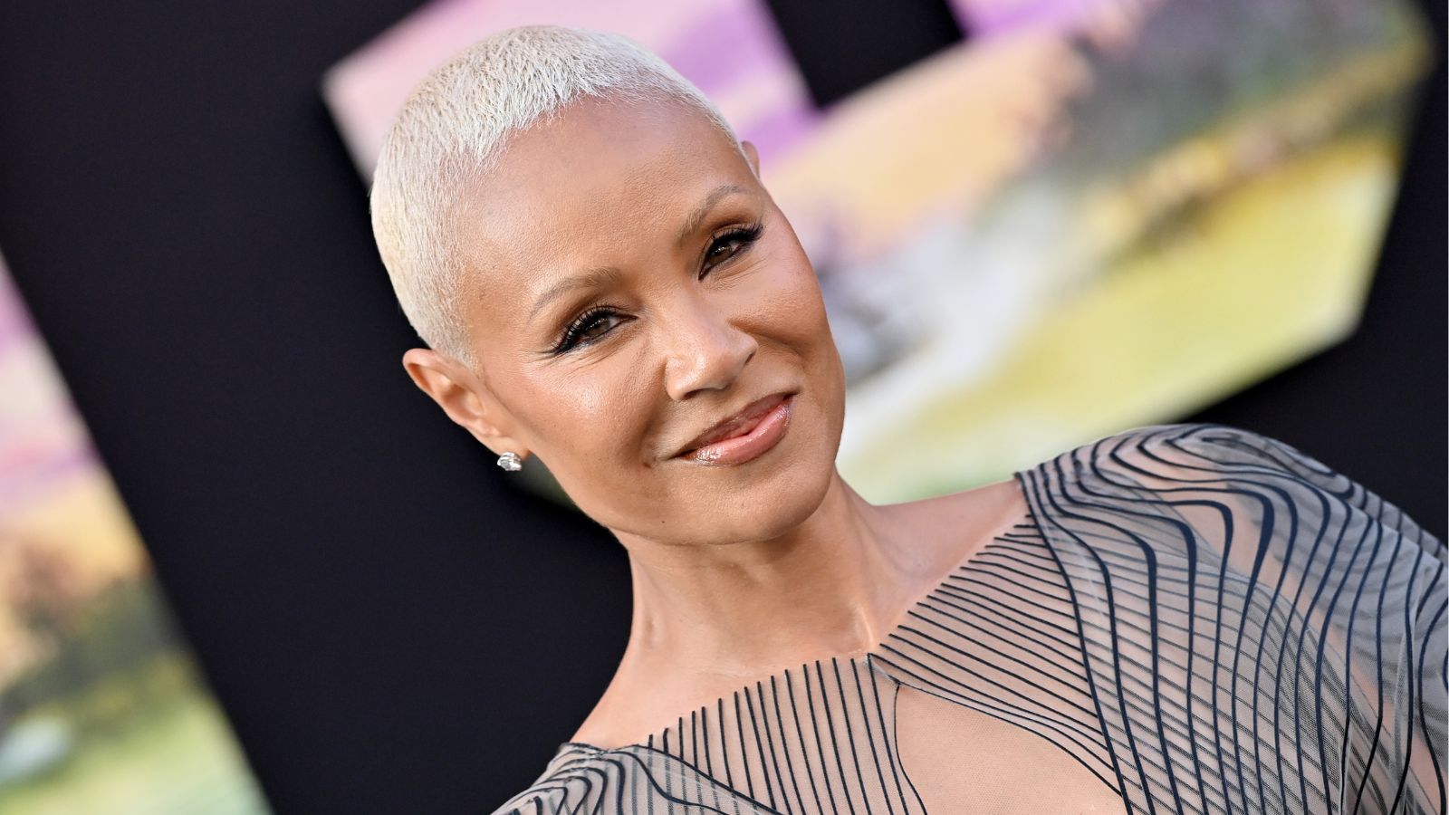 jada pinkett smith on a black background