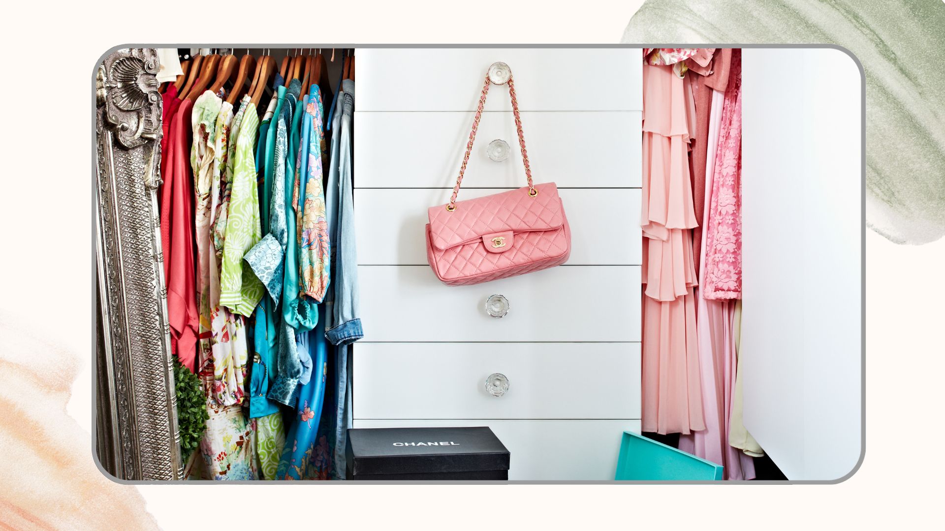 Close up shot of a white wardrobe with doors open to show colourful clothes hanging and a pink Chanel bag hung from the door knob of the drawers