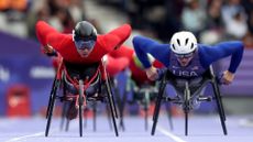 Hua Jin of Team People's Republic of China and Daniel Romanchuk of Team USA compete during the Men's 800m 