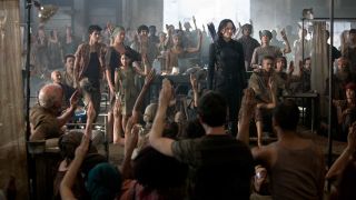 Jennifer Lawrence as Katniss Everdeen and the rebellion in Hunger Games: Mockingjay Part 1