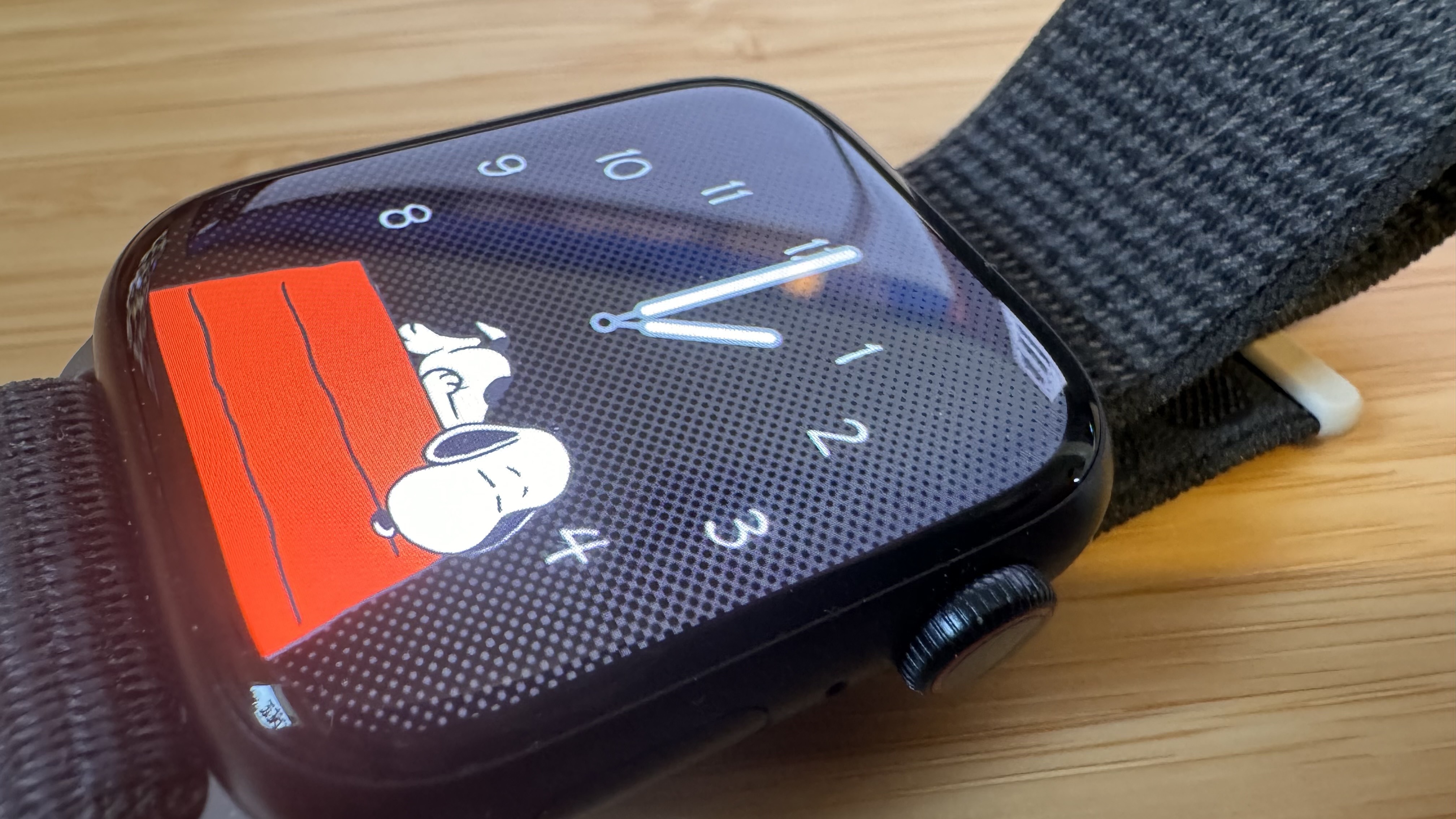 A Midnight Apple Watch Series 9 sitting on a desk