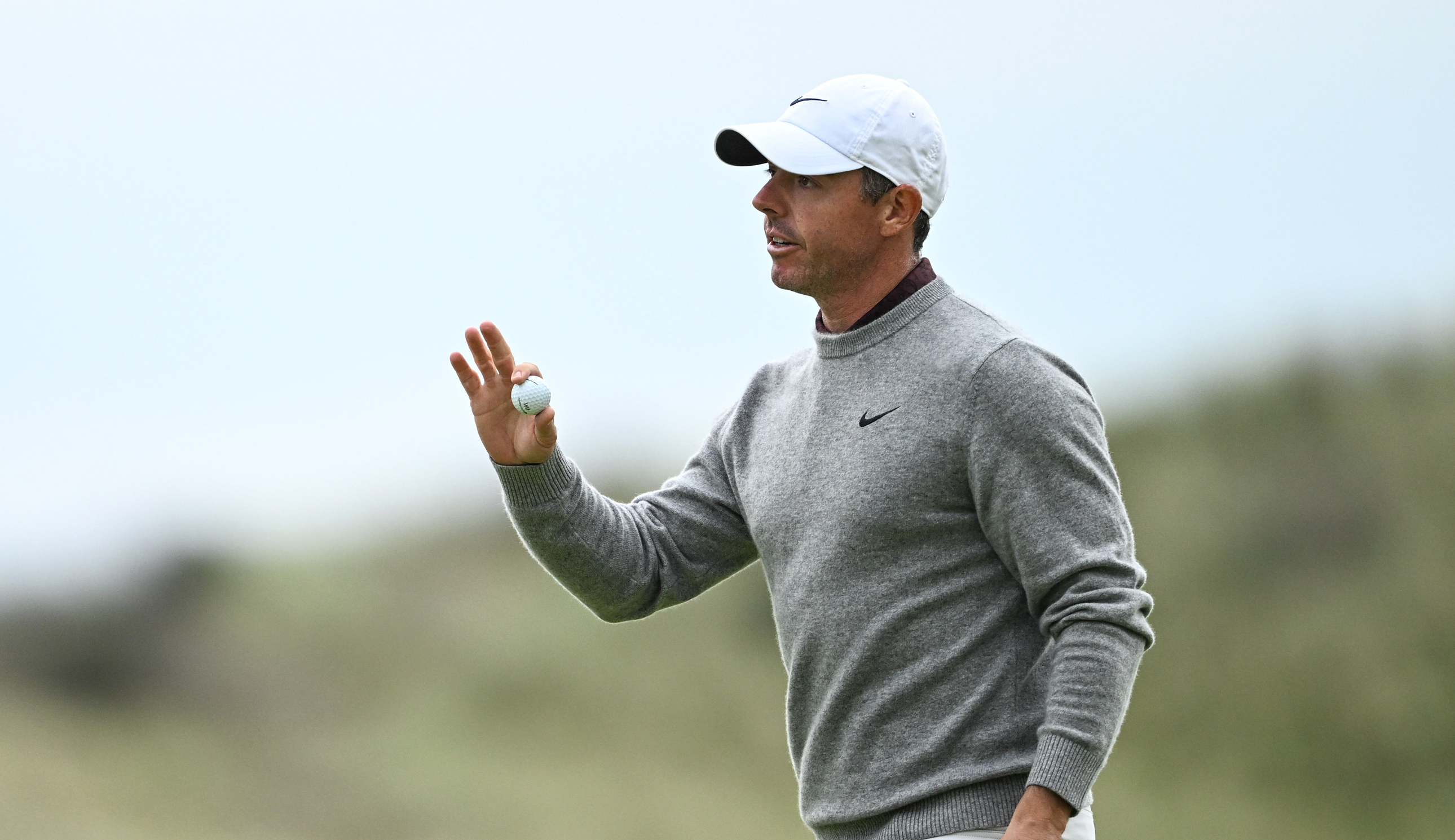 Rory McIlroy waves to the crowd