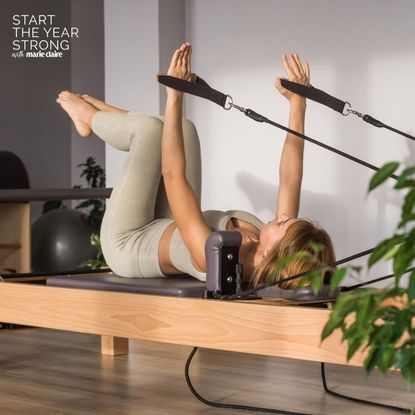 Best at-home Reformer Pilates machines - woman using reformer