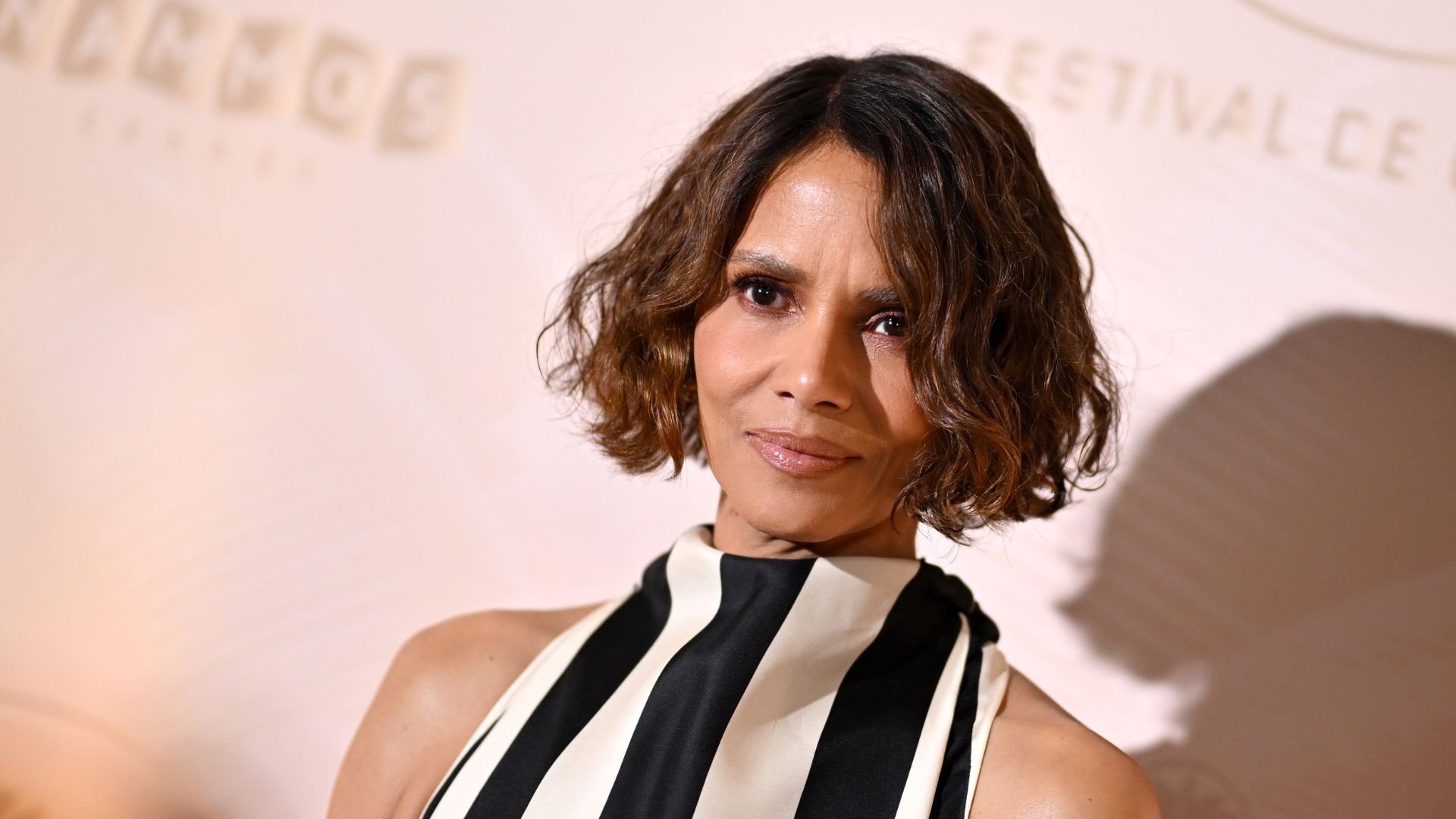I can't get Halle Berry's colour block swimsuit out of my head - it's the most flattering one-piece I've seen this summer