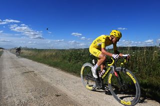 TROYES FRANCE JULY 07 Tadej Pogacar of Slovenia and UAE Team Emirates Yellow Leader Jersey attacks passing through a gravel strokes sector during the 111th Tour de France 2024 Stage 9 a 199km stage from Troyes to Troyes UCIWT on July 07 2024 in Troyes France Photo by Tim de WaeleGetty Images