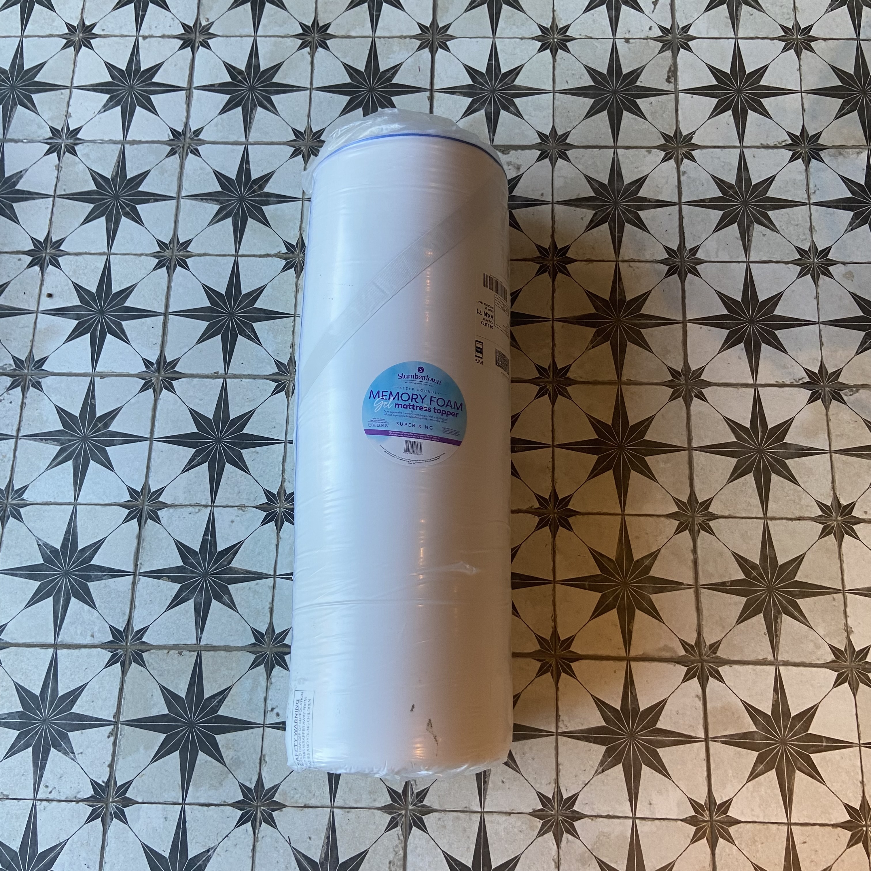 Slumberdown Memory Foam Gel Mattress Topper being tested at home