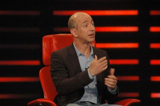 Jeff Bezos sitting in a chair