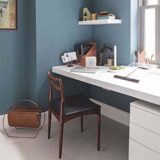 home office with white table and chair