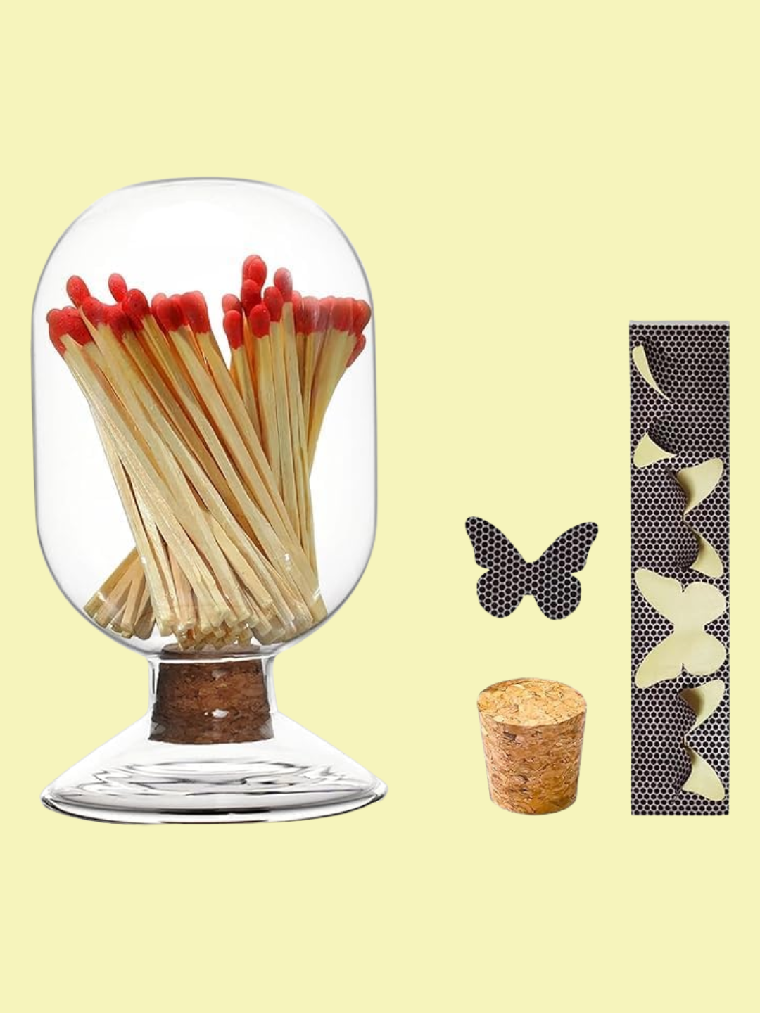 A glass match holder with butterfly striker adhesives from Amazon