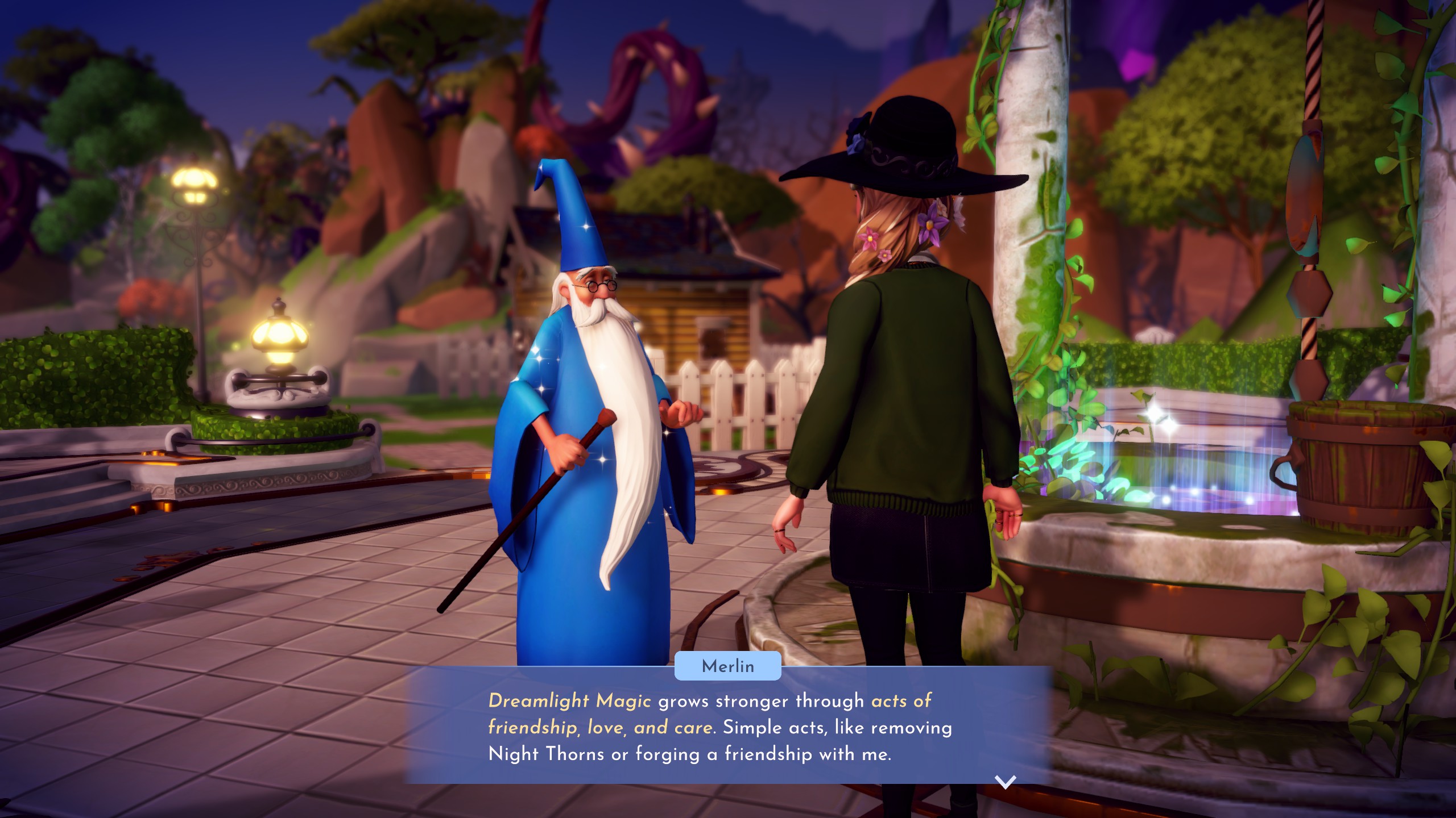 Disney Dreamlight Valley - Merlin stands near the center of Dreamlight Valley's plaza telling the player that magic grows stronger through acts of friendship, love, and care.