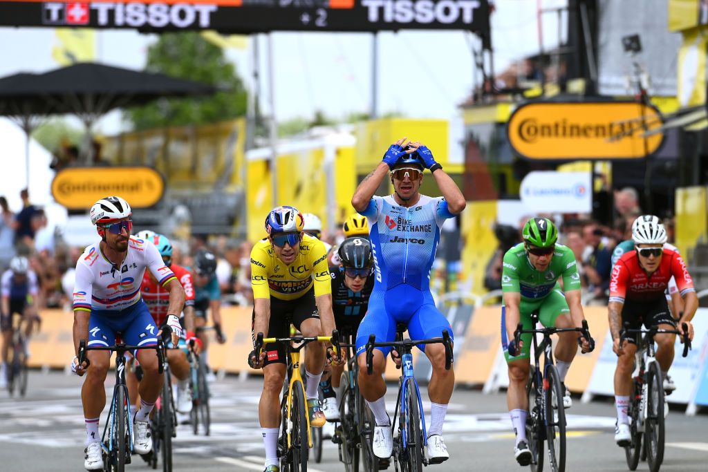 SONDERBORG DENMARK JULY 03 Dylan Groenewegen of Netherlands and Team BikeExchange Jayco celebrates at finish line as stage winner ahead of Wout Van Aert of Belgium and Team Jumbo Visma Yellow Leader Jersey Peter Sagan of Slovakia and Team Total Energies Alberto Dainese of Italy and Team DSM and Fabio Jakobsen of Netherlands and QuickStep Alpha Vinyl Team Green Points Jersey during the 109th Tour de France 2022 Stage 3 a 182km stage from Vejle to Snderborg TDF2022 WorldTour on July 03 2022 in Sonderborg Denmark Photo by Tim de WaeleGetty Images