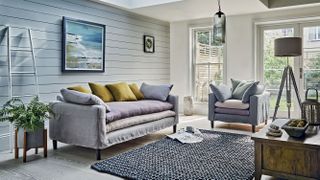 Linen sofa and chair in coastal living room