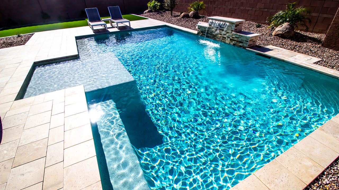 Swimming pool with water fountain