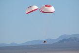 Boeing's CST-100 space capsule falls to Earth in a successful parachute drop test held April 3, 2012, at the Delamar Dry Lake Bed near Alamo, Nev.