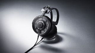 Audio-Technica ATH-ADX7000 open-back headphones on a white background