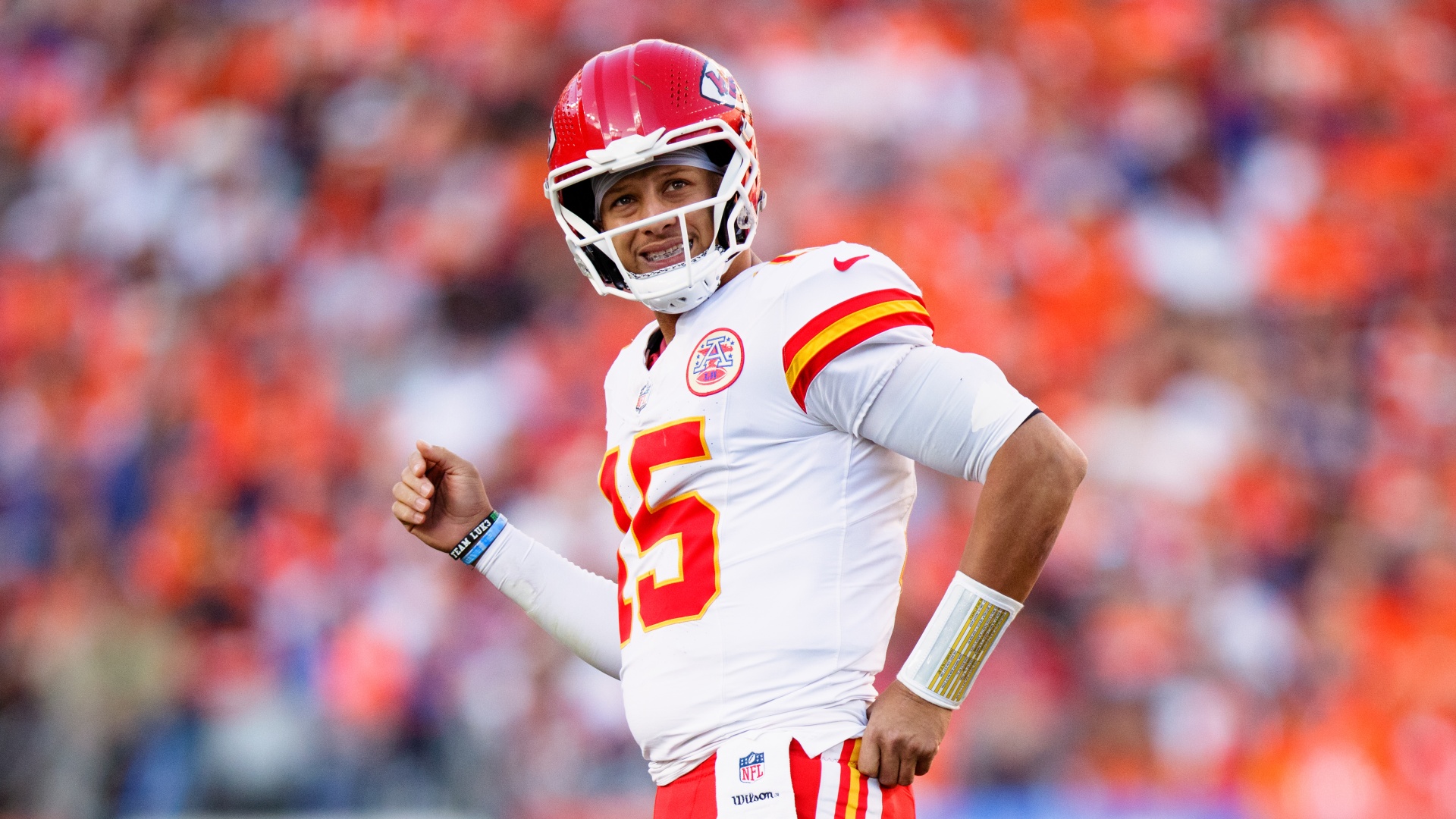 Patrick Mahomes grimacing during the Kansas City Chiefs' defeat by the Denver Broncos