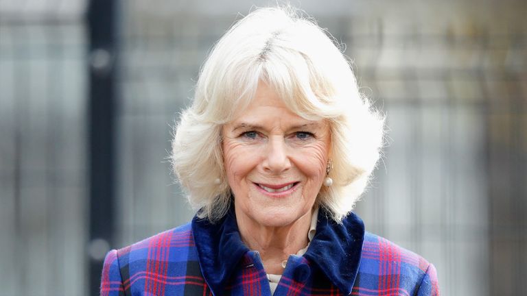 Camilla, Duchess of Cornwall watches a horse riding display