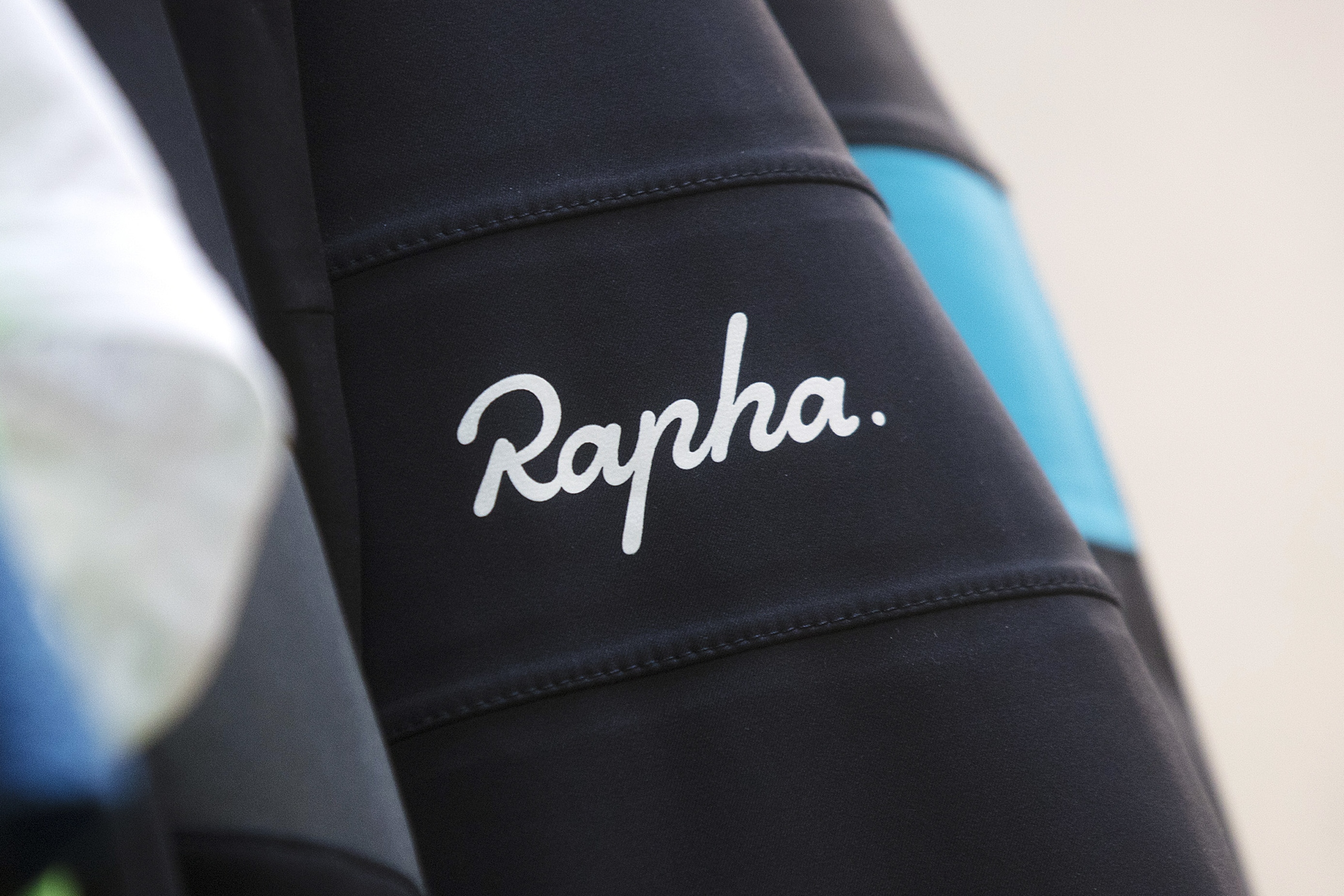 The Rapha logo on a cycling jacket sleeve