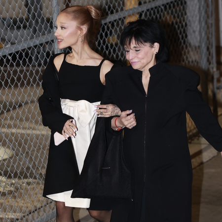 Superstar singer and actress Ariana Grande walks arm in arm with her mother Joan as they leave 'Jimmy Kimmel Live' in Hollywood.