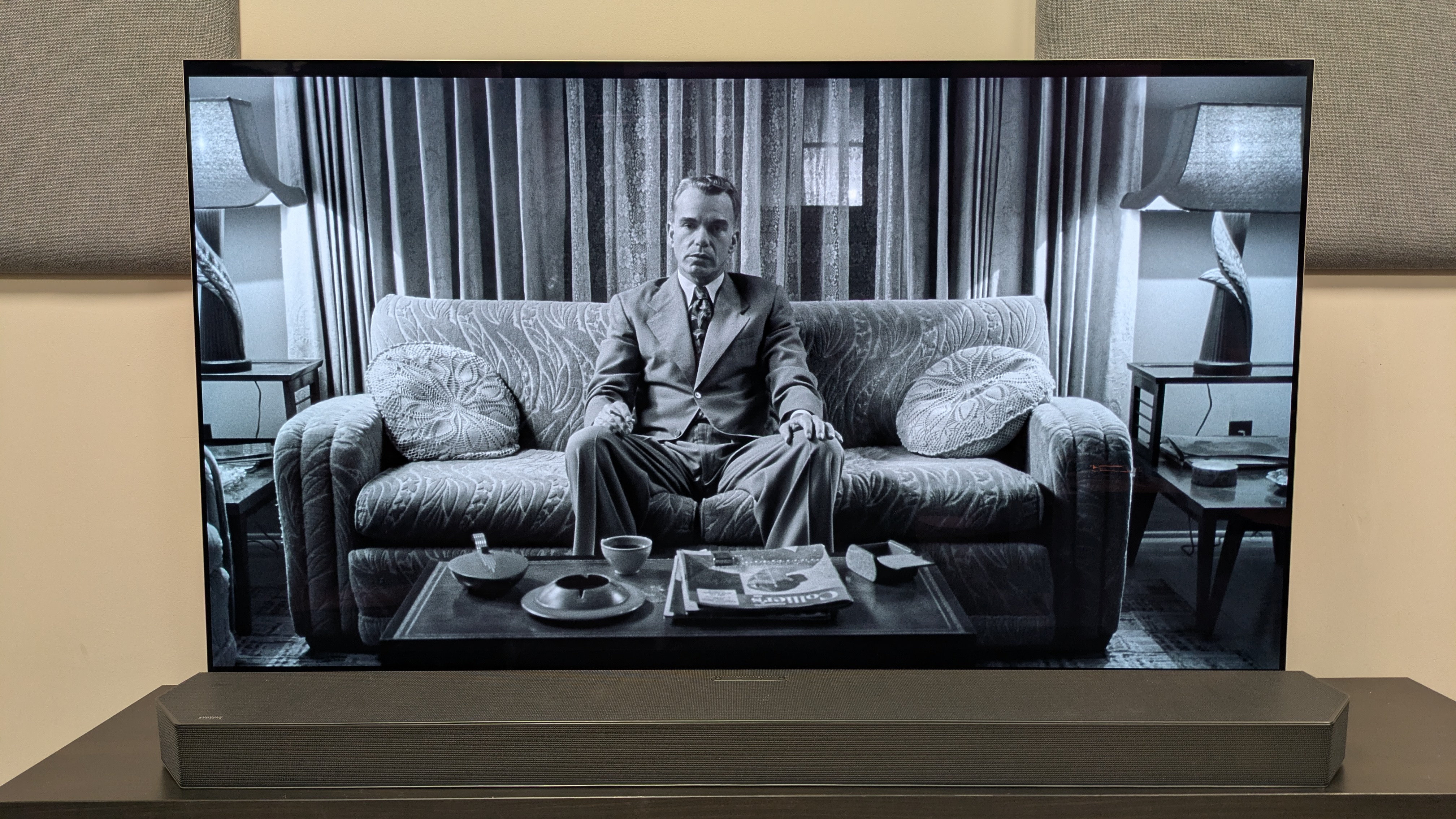 The Man Who Wasn't There 4K Blu-ray on LG G5 showing Ed sat on his sofa at home smoking 