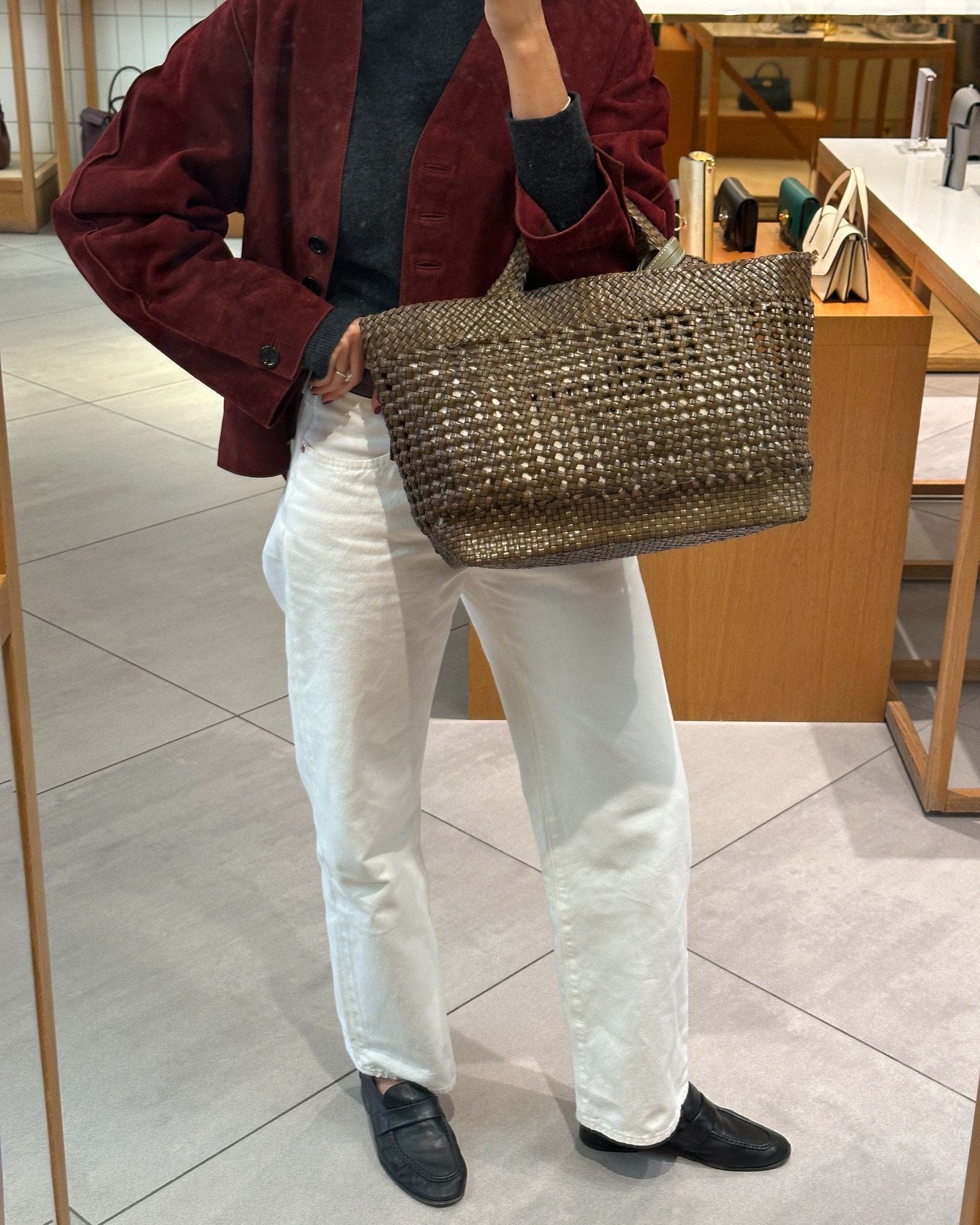 Chic woven leather bag in urban setting