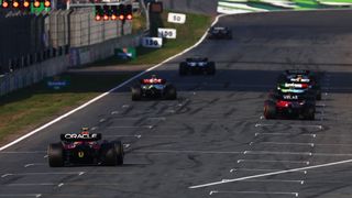 Sergio Perez of Mexico driving the (11) Oracle Red Bull Racing RB18 lines up behind others to practice starts at the end of practice ahead of the F1 Grand Prix of The Netherlands at Circuit Zandvoort on September 02, 2022