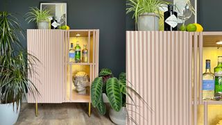 pink reeded cocktail cabinet with gold leaf detail