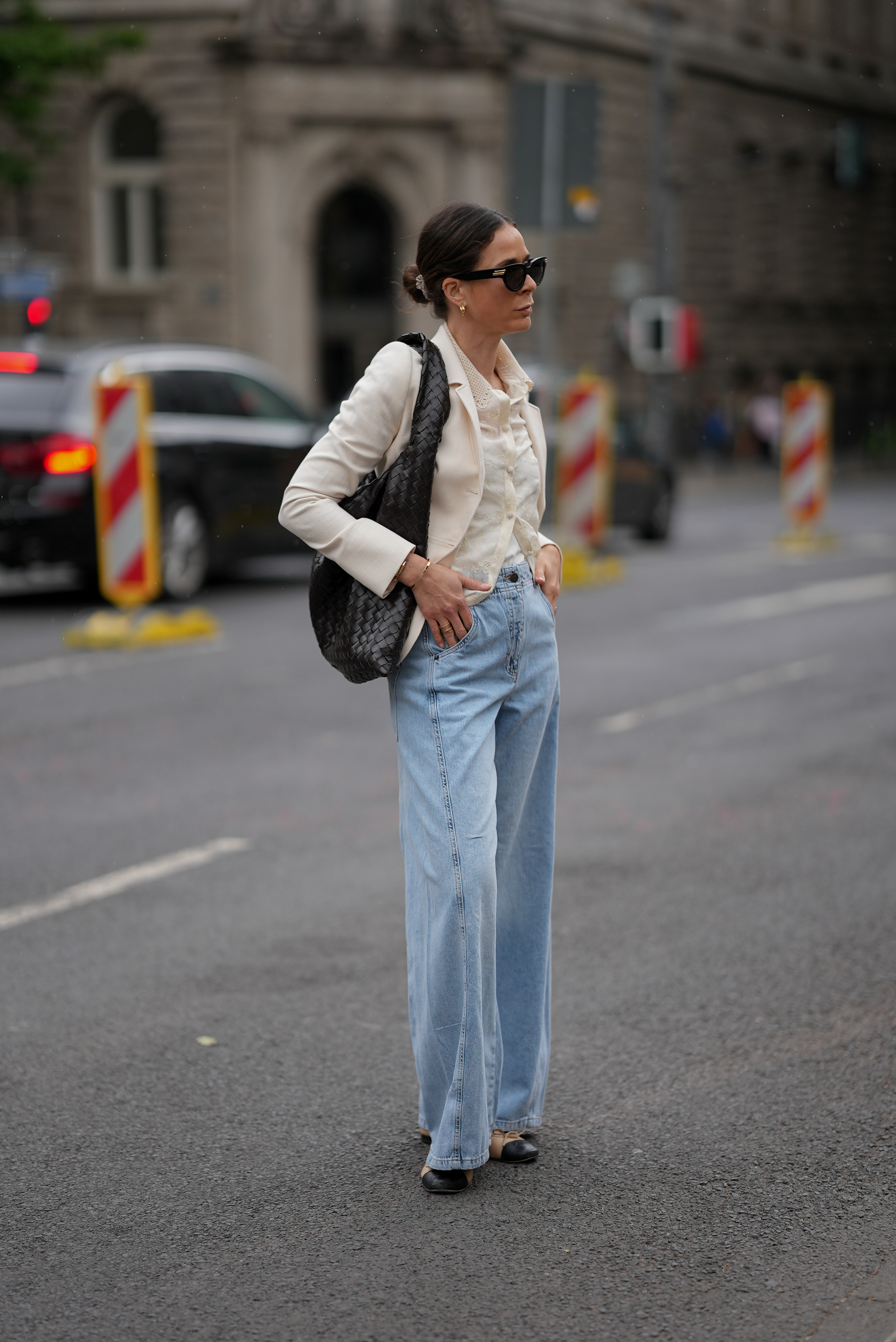 Patricia Wirschke is seen wearingbottega veneta hobo bag a vanilla white contour seamed summer blazer with lapel collar and two dark buttons from ME+EM; a light cream silk and cotton organza blouse