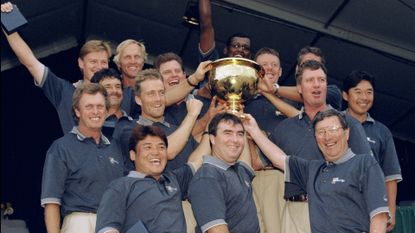 The International Team celebrate their win as they hold up the Presidents Cup Trophy after the 1998 Presidents Cup at the Royal Melbourne Golf Course in Melborne, Australia. The International team defeated the U.S.A. team. 