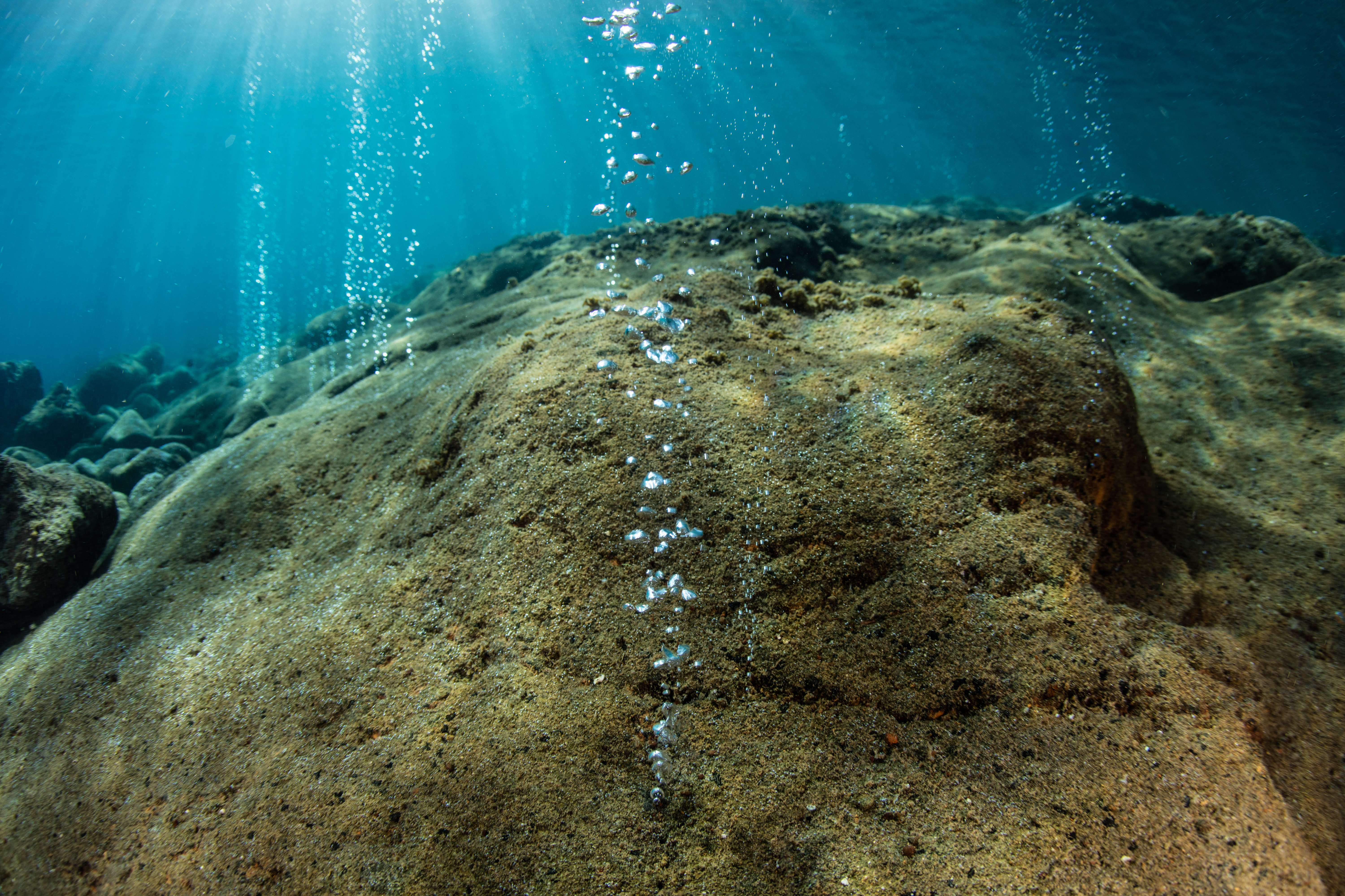 Bubbles under the water.
