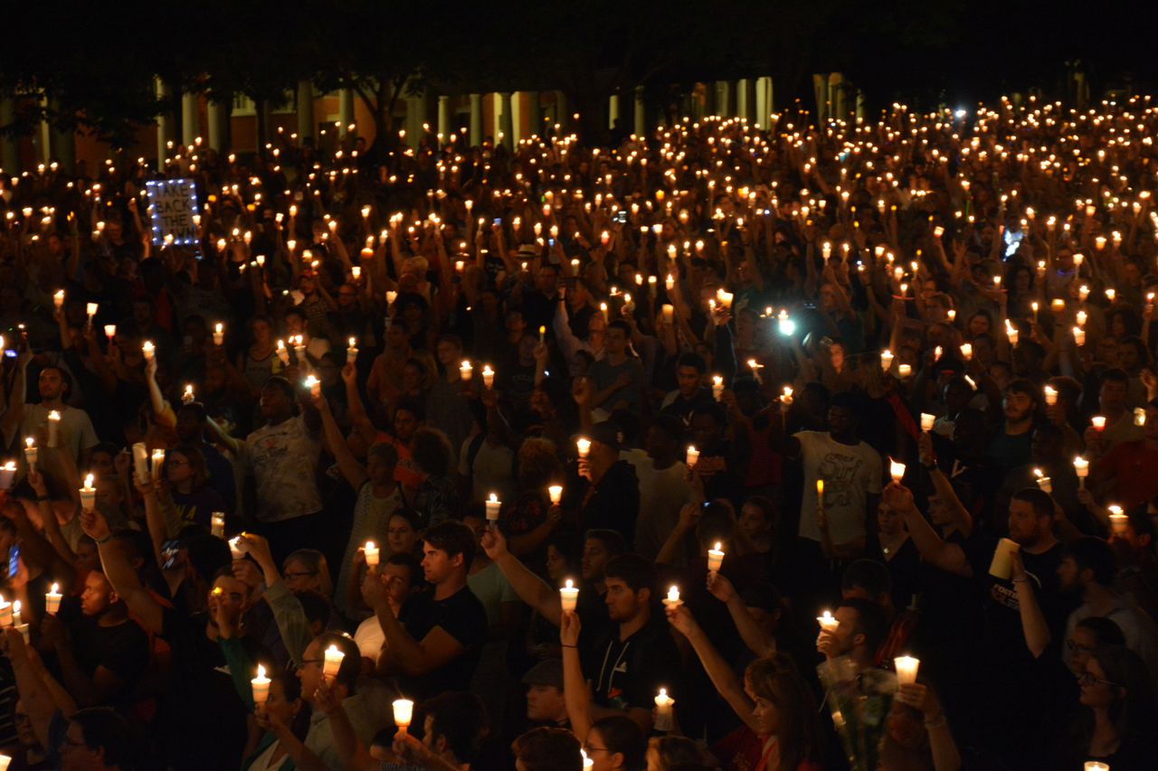 Candles held at a vigil for Heather Heyer.