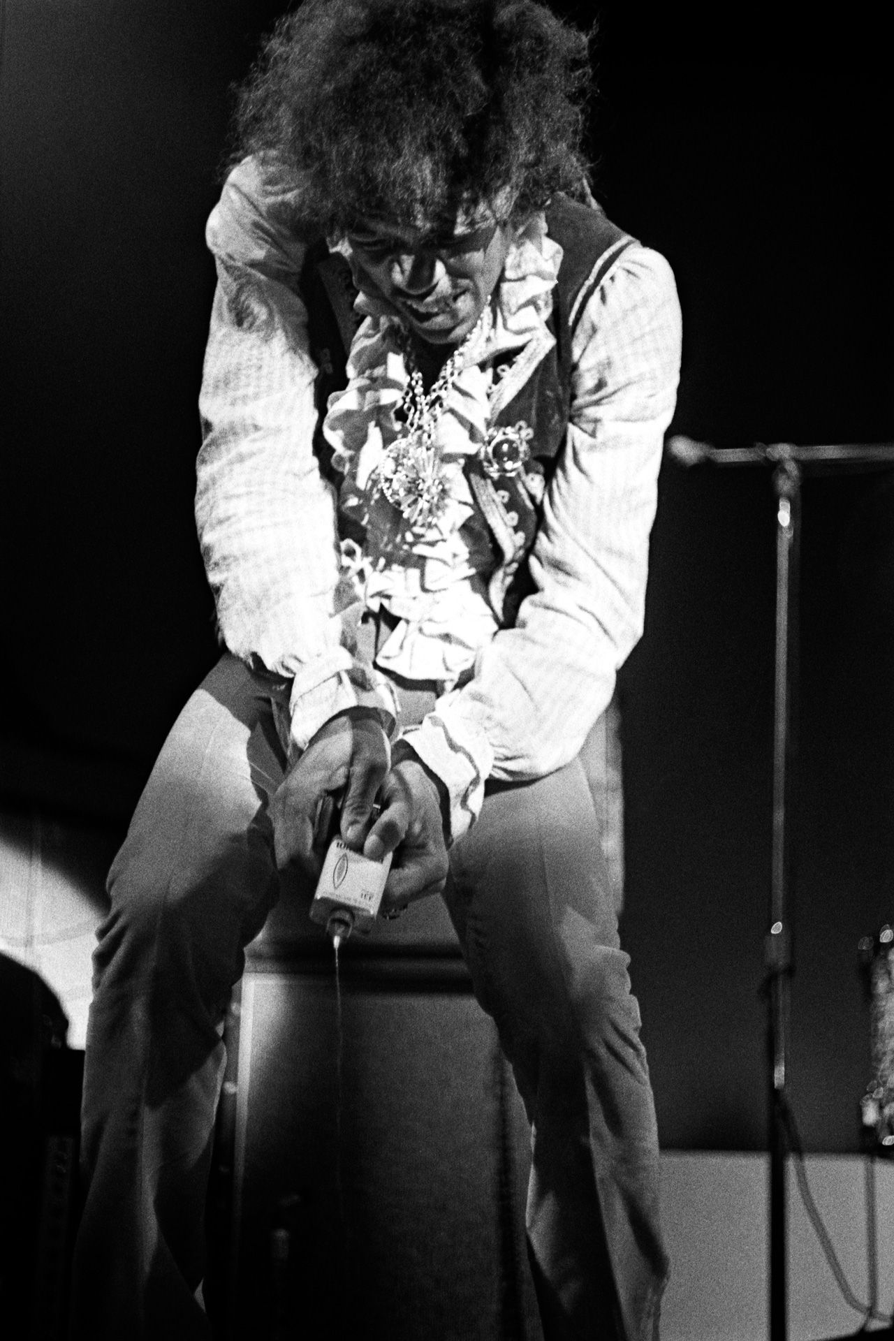 Jimi Hendrix sets fire to his guitar...