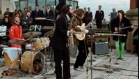 A film still showing the Beatles performing on the roof of Apple Corps at 3 Savile Row in Mayfair, London, on January 30, 1996