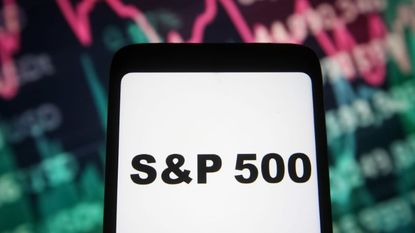 a S&P 500 words are seen on a smartphone screen