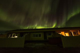 The common ‘forest fire’ image of the northern lights in the distance doesn’t require a particularly strong display. Image: Jamie Carter