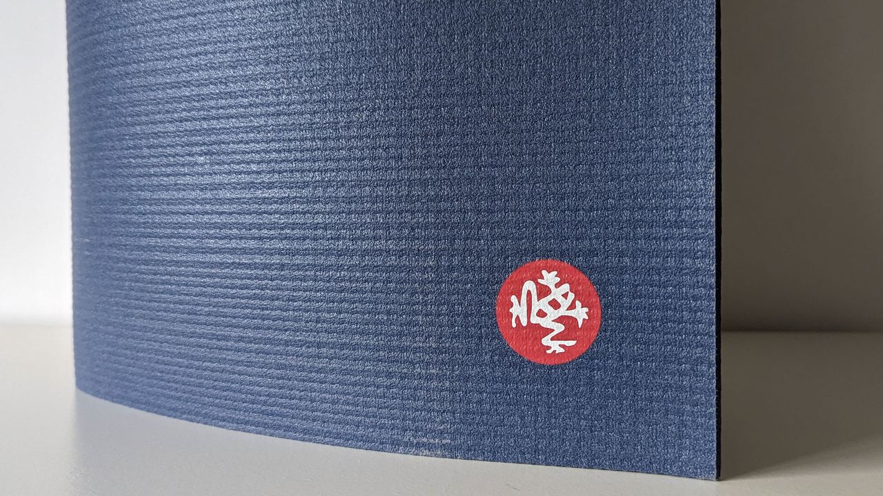 Manduka PRO yoga mat close-up texture shot with logo on mat in view