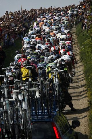 The crowds cheer on the Amstel Gold Race peloton