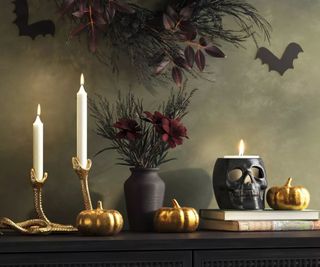 Gold Halloween decorations, flowers and wreath