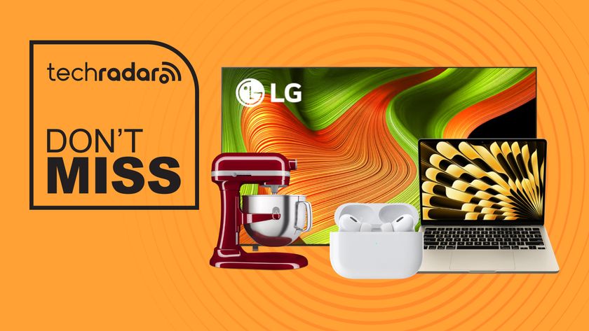 Assorted tech products on bright orange background with don&#039;t miss text overlay