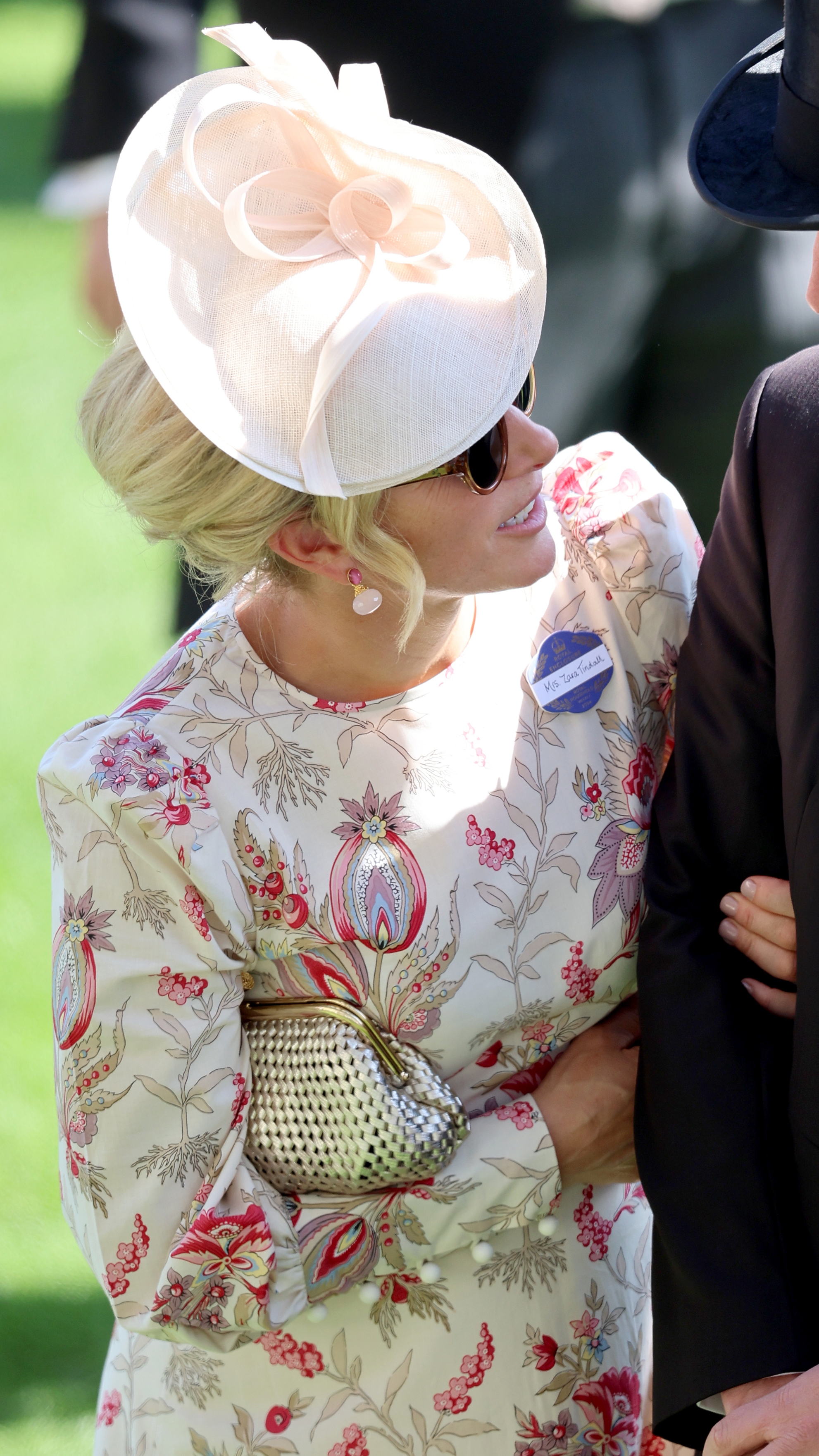 Zara Tindall attends day two of Royal Ascot 2024 at Ascot Racecourse on June 19, 2024, holding an Anya Hindmarch clutch